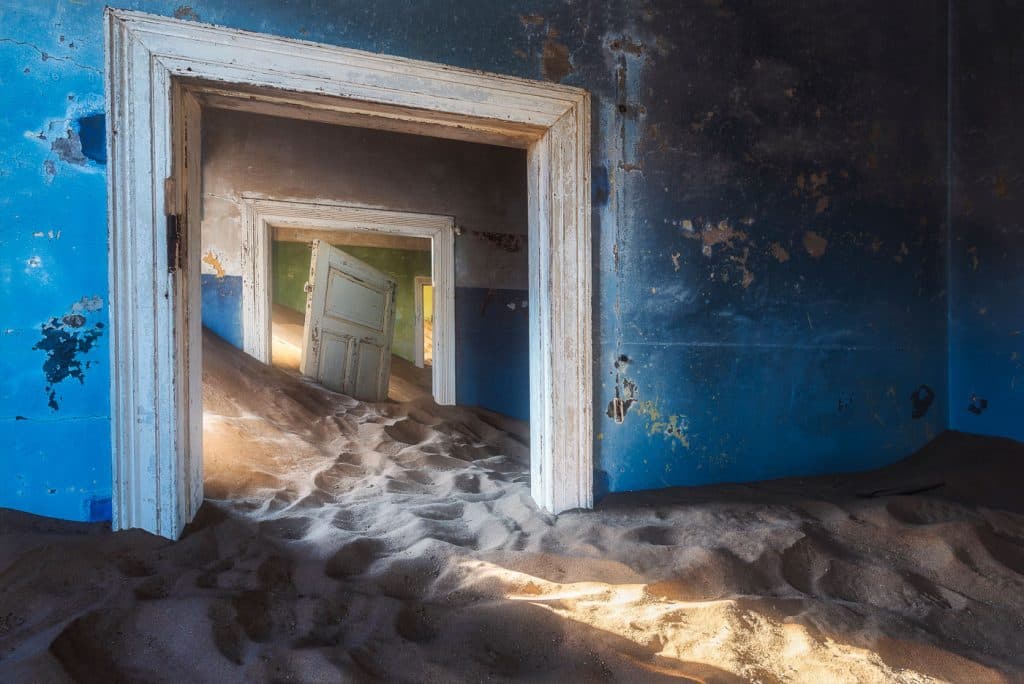 Sand-filled room in the Kolmanskop ghost town, Namibia